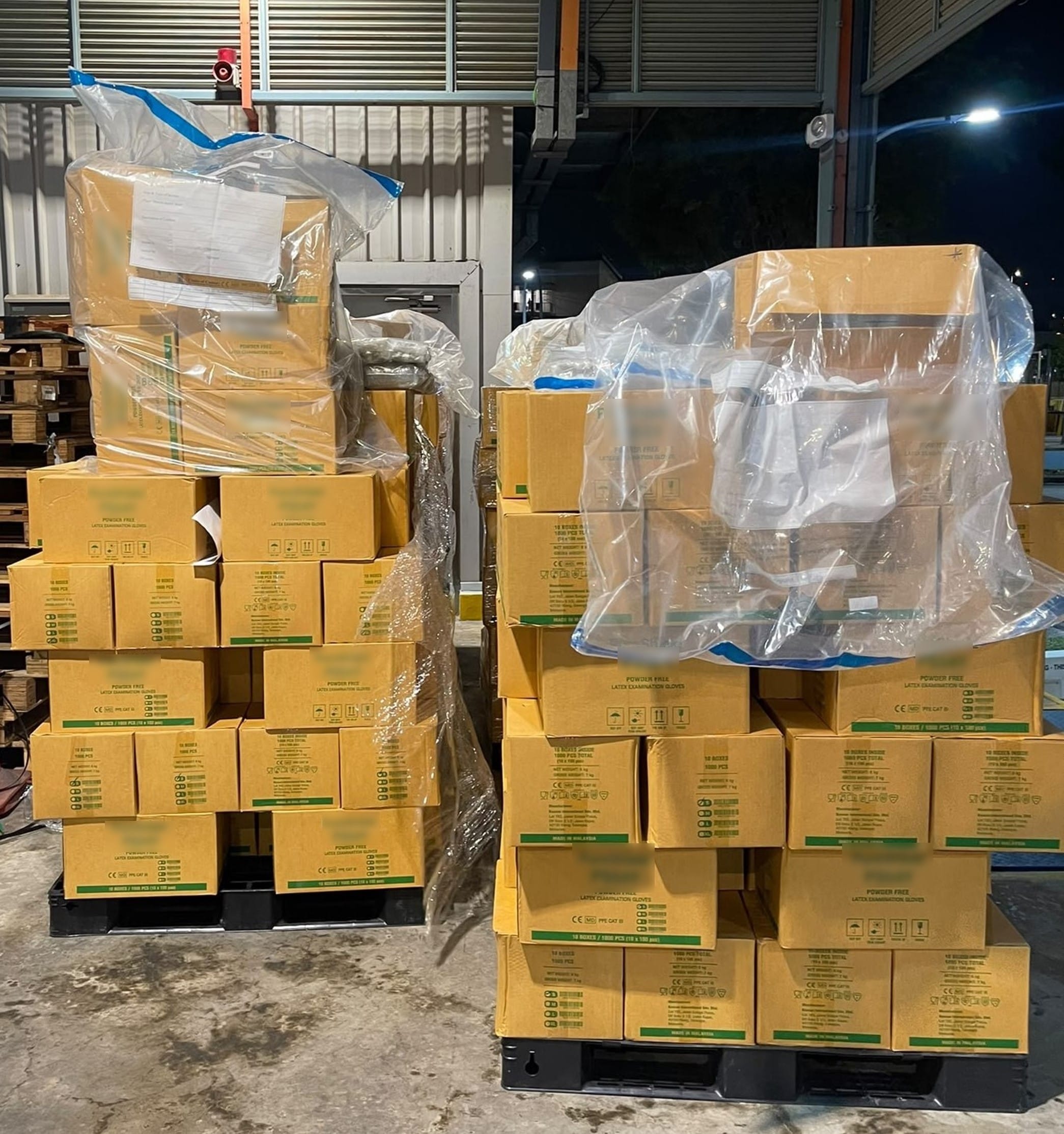 Photo 1 (CNB): Boxes containing cannabis seized from the container on 24 September 2026.